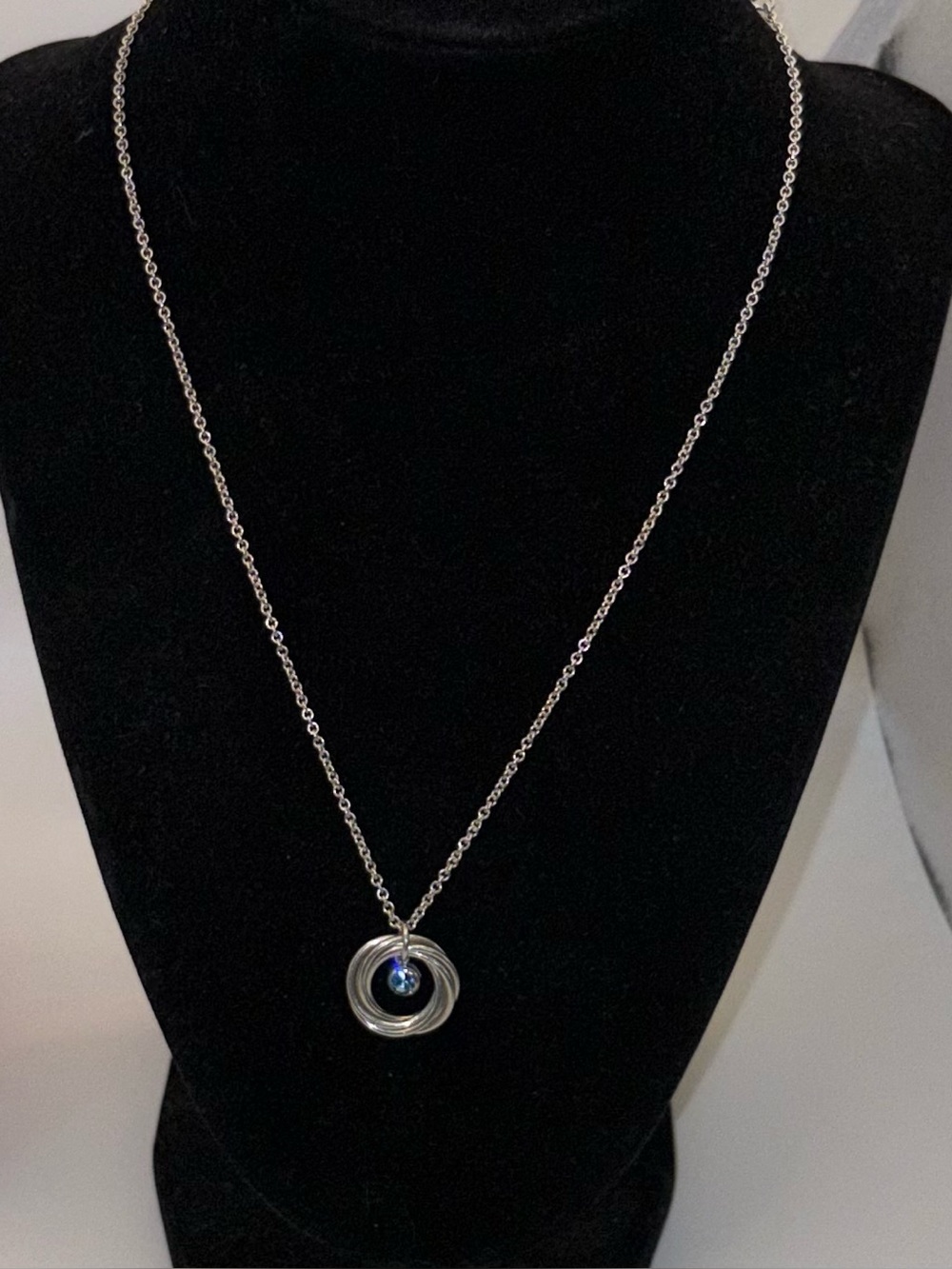 Sterling Silver Circle Pendant Necklace with Blue Crystal